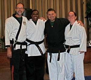 Senior Instructor Mark McGee and Grace Martial Arts Black Belt Instructors